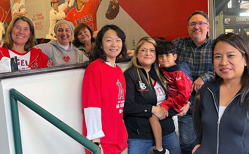 Length of Stay team with Stephanie Garcia, Vice President, Operations, MemorialCare Long Beach Medical Center and Miller Children’s & Women’s Hospital, celebrating Pride Night from a MemorialCare sponsored suite at Angel Stadium.