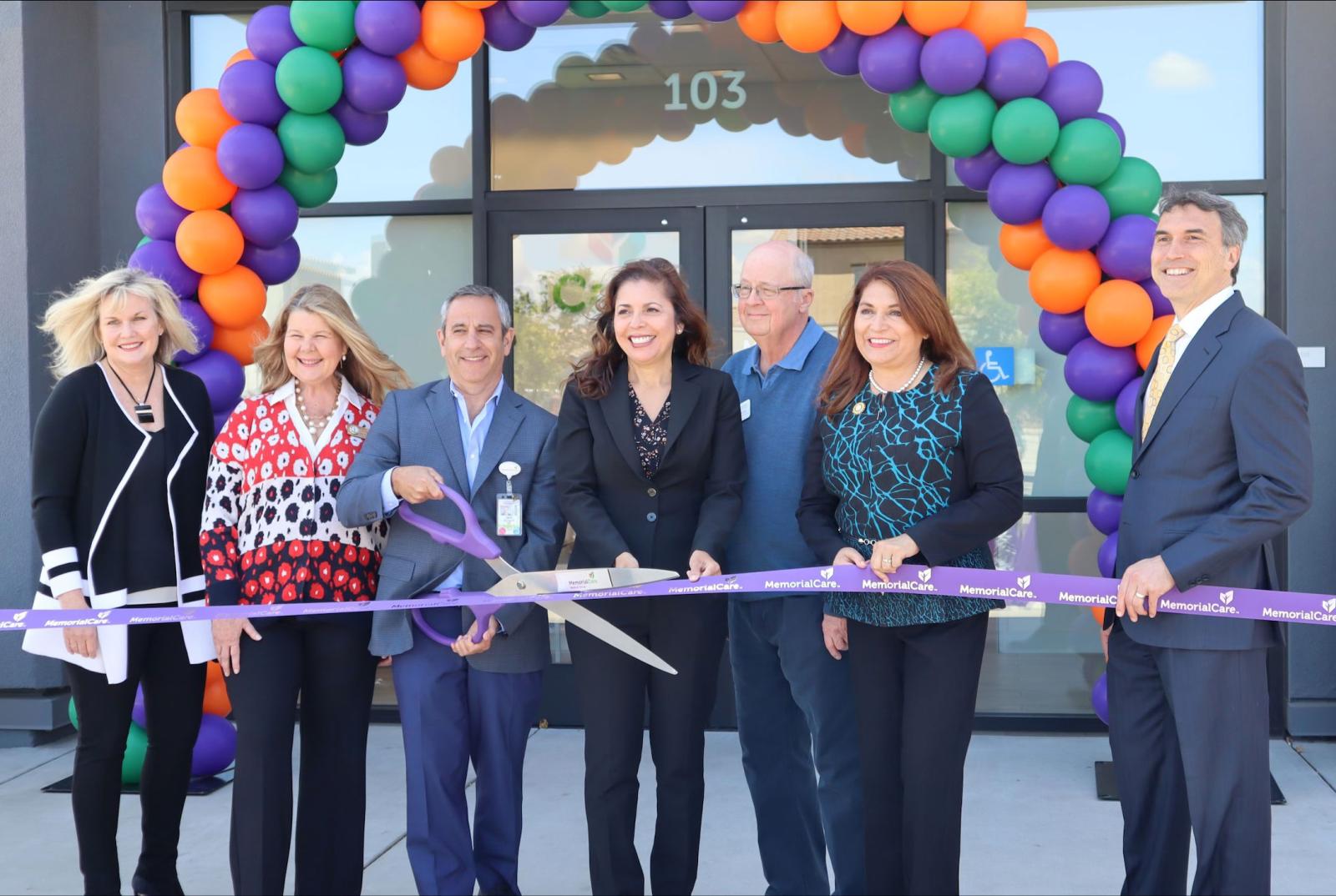 MemorialCare executives and Cypress officials cut the ribbon to open the new MemorialCare Medical Group Cypress location.