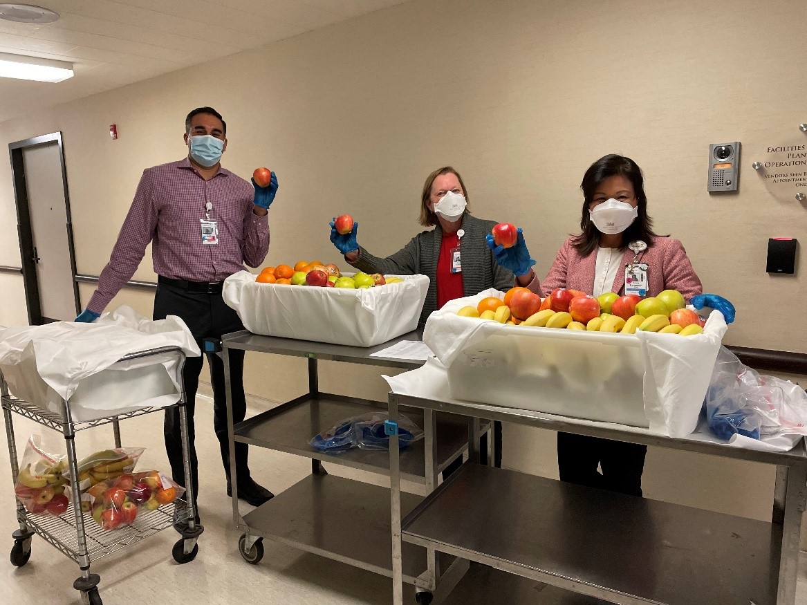 Leadership at MemorialCare Orange Coast Medical Center celebrate Wear Red Day by wearing red and passing out heart- healthy treats to hospital employees.