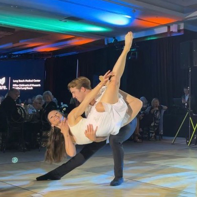 Featured dancer, Melissa Sandvig, is lifted across the dance floor at the 14th annual Dancing for Our Stars Gala benefiting MemorialCare Long Beach Medical Center and Miller Children’s & Women’s Hospital Long Beach.
