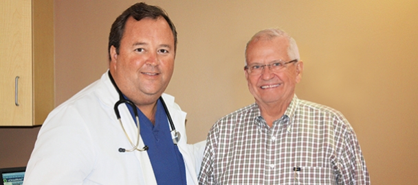 Image of patient John Hundley and his interventional cardiologist Michael Gault, M.D.