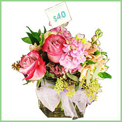 Image of flowers in vase - $40 'rosy outlook' bouquet